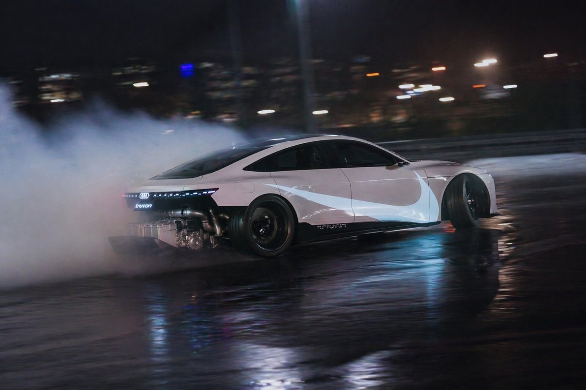 Electric Drift in Neon Rain — Sora 2 Prompt