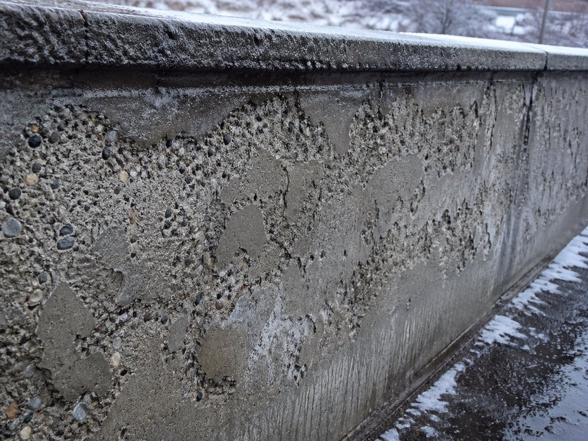 Winter Concrete Salt Damage Close-Up — Sora 2 Prompt