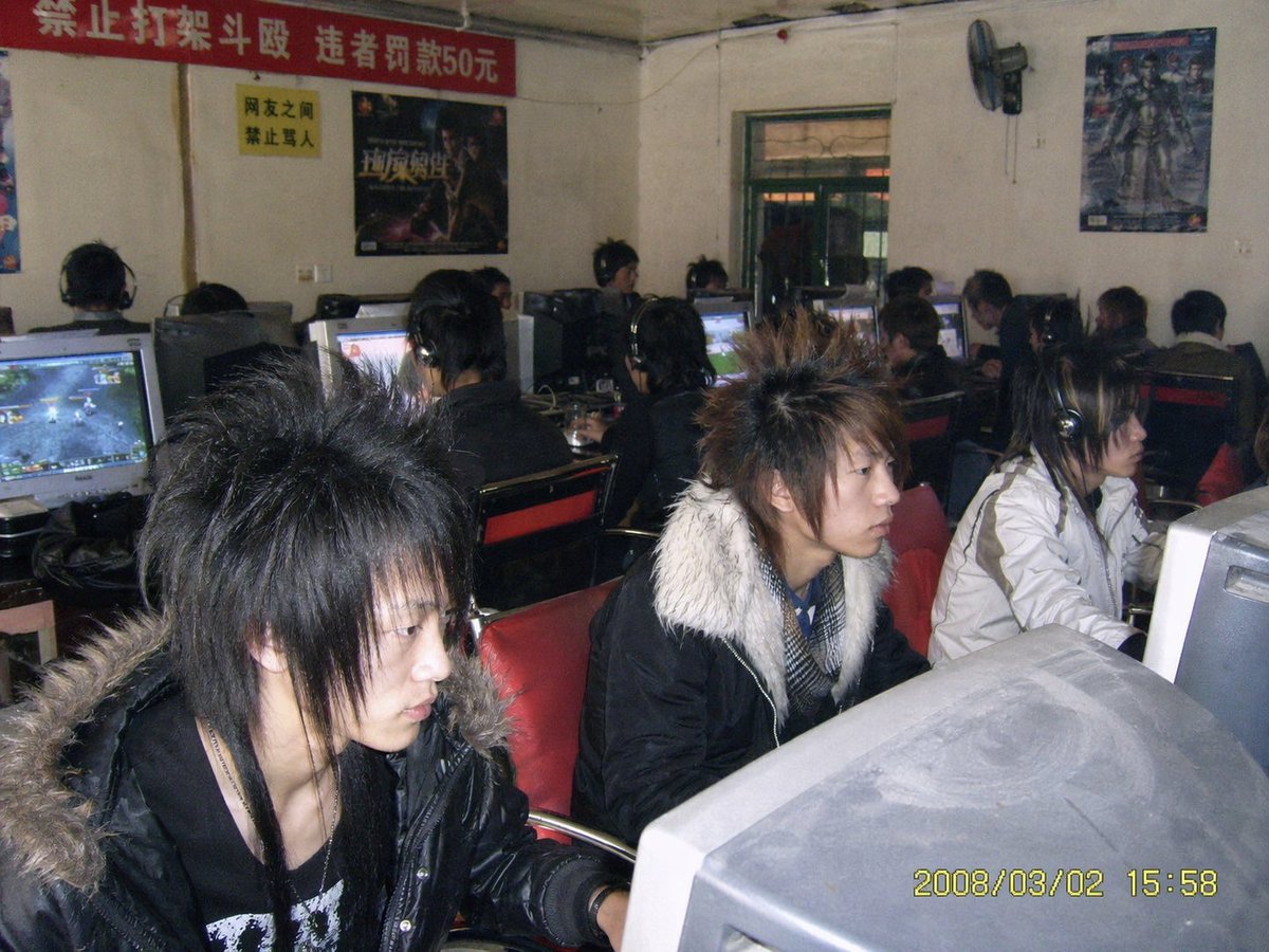 Nostalgic 2008 Chinese Internet Cafe Photo — Sora 2 Prompt