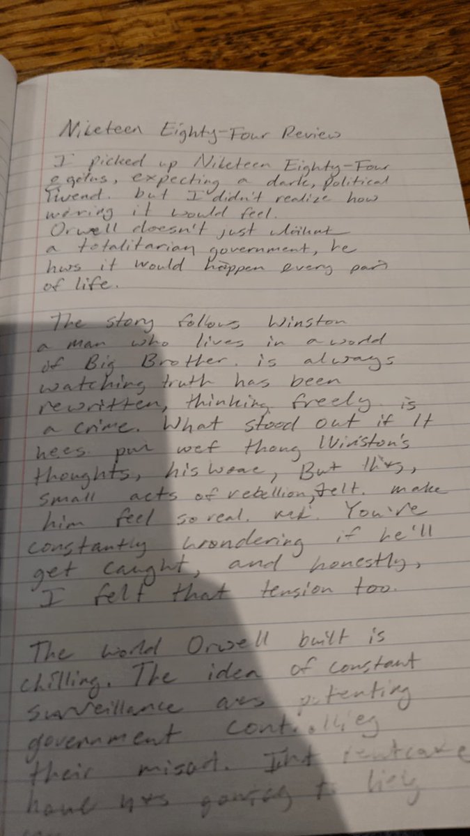 Messy Handwriting Notebook Photo — Realistic Phone Shot