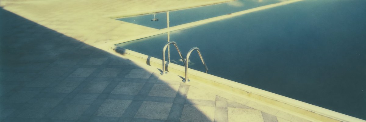 Vintage Panoramic Pool — Cinematic AI Photography Prompt
