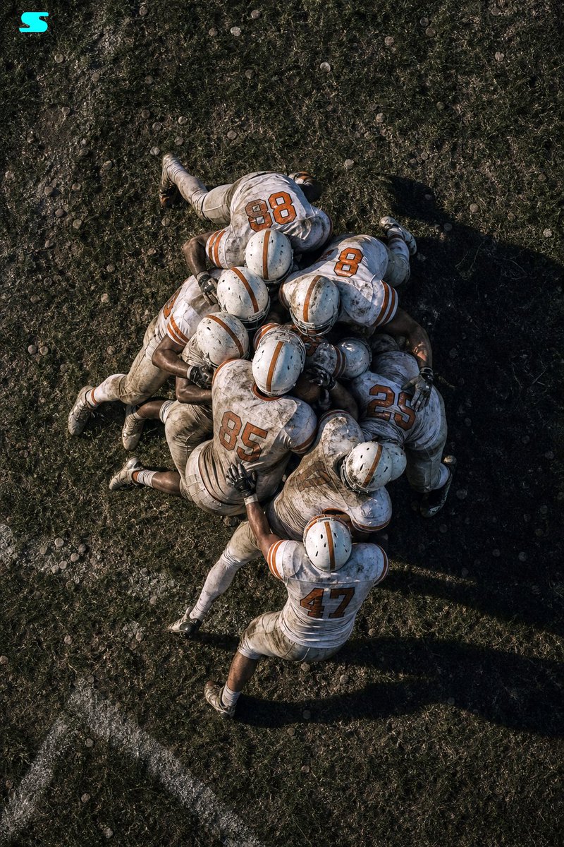 Cinematic Aerial Football Huddle — Sora 2 Prompt
