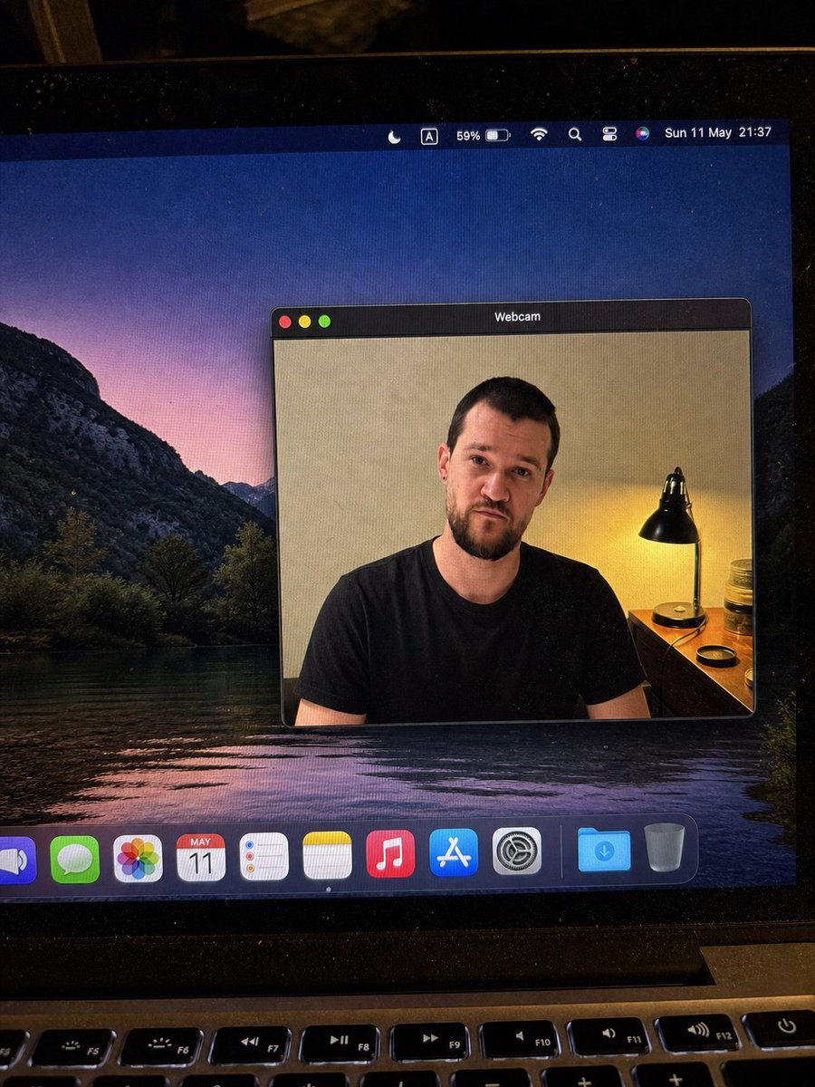 MacBook Webcam Photo with Blurred Face — Realistic AI Prompt