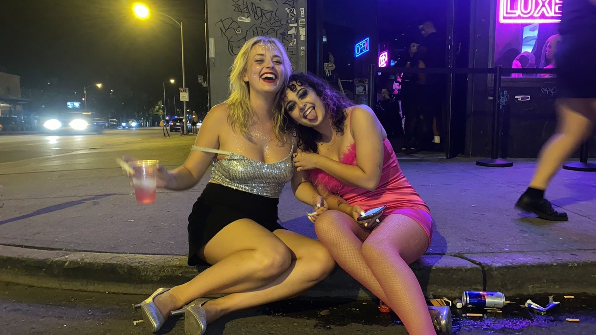 Neon Nightclub Street Snapshot — Sora 2 AI Prompt