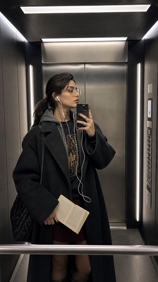 Modern Elevator Mirror Selfie — Sora 2 Prompt