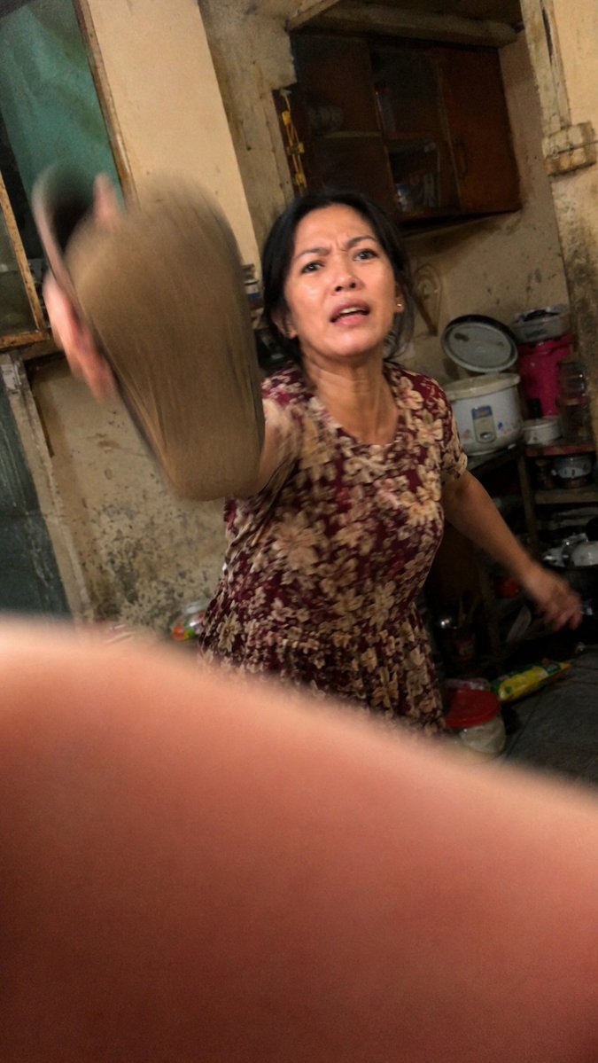 Raw Smartphone Snapshot — Chaotic Kitchen Confrontation Prompt