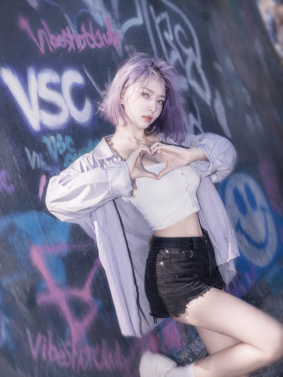 Urban Streetwear Portrait with Neon Graffiti — Sora 2 Prompt
